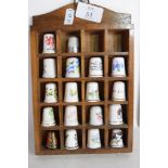 THIMBLES MOUNTED WITHIN A SMALL WALL UNIT