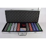 LARGE CASED SET OF POKER CHIPS