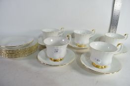 QUANTITY OF ROYAL ALBERT VAL D'OR CUPS AND SAUCERS