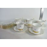 QUANTITY OF ROYAL ALBERT VAL D'OR CUPS AND SAUCERS