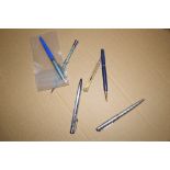 BAG CONTAINING QUANTITY PENS