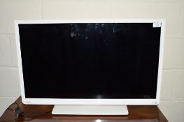 TOSHIBA 32" FLAT SCREEN TV WITH BUILT-IN DVD PLAYER