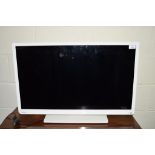 TOSHIBA 32" FLAT SCREEN TV WITH BUILT-IN DVD PLAYER