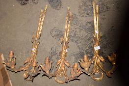 SET OF THREE MATCHING ORMOLU WALL SCONCES, EACH MOULDED WITH FLORA/FAUNA DECORATION, EACH HEIGHT