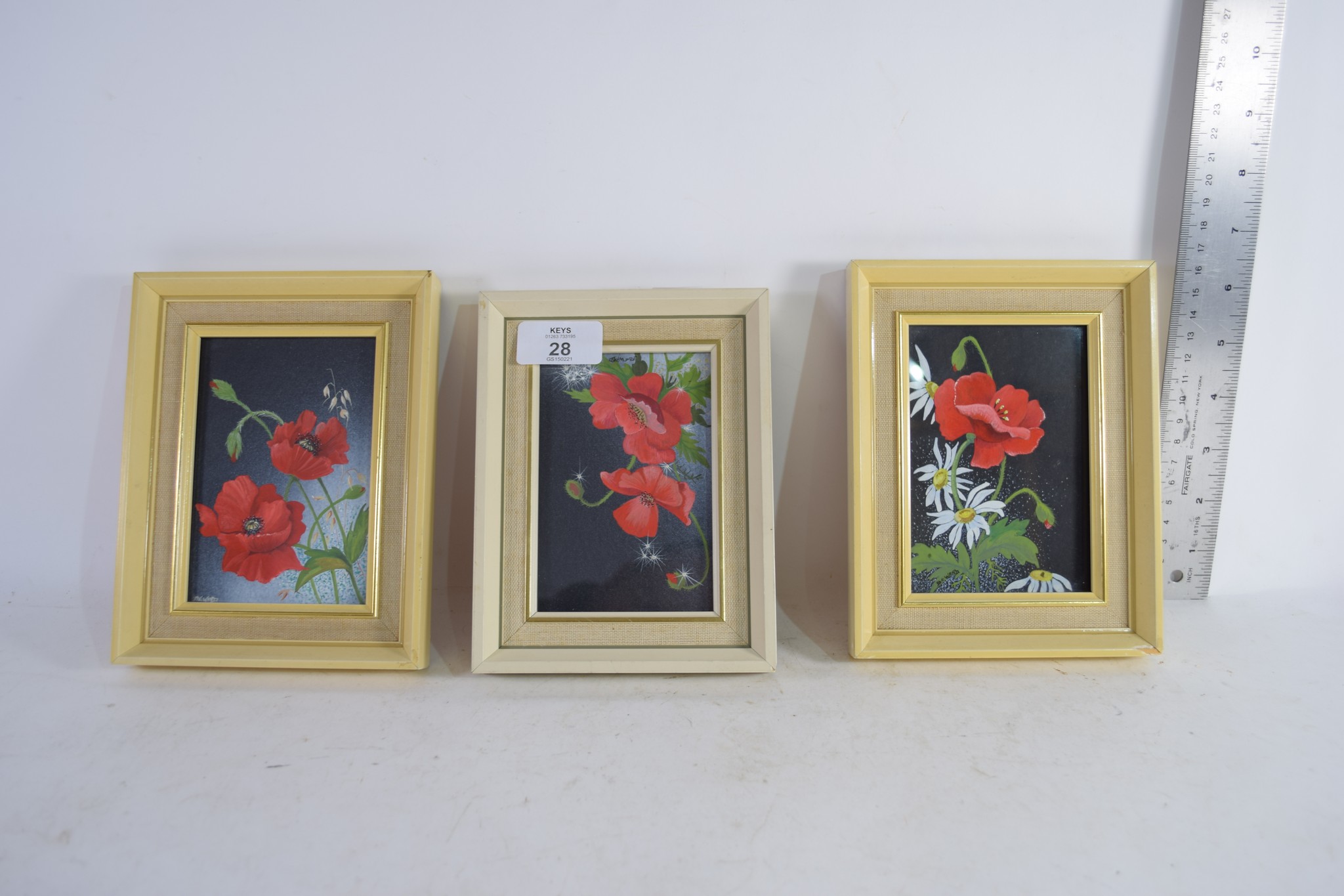 SET OF THREE SMALL FRAMED PICTURES OF FLOWERS