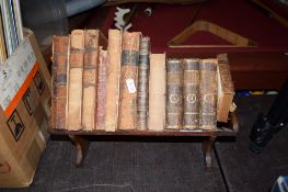 BOOK TROUGH CONTAINING A QUANTITY OF SMALL LEATHER BOUND AND OTHER VINTAGE VOLUMES