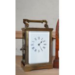 SMALL EARLY TO MID-20TH CENTURY BRASS CASED CARRIAGE CLOCK