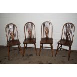 SET OF FOUR WHEEL BACK DINING CHAIRS