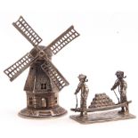 Mixed Lot: novelty Dutch white metal windmill, 7cm tall, together with a Continental white metal