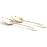 Pair of Georgian base marked table spoons feather edged Old English pattern, initialled "AG, IG",