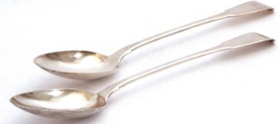 Pair of George III basting spoons in Fiddle pattern, each initialled W in script, London, 1817 by