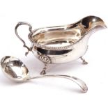 Mixed Lot: George V silver sauce boat of typical form, gadrooned rim with capped scroll handle,