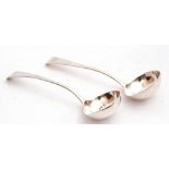Pair of George III silver sauce ladles, Old English pattern, each handle engraved with a monogram,