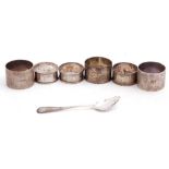Mixed Lot: pair of silver napkin rings of plain polished design, London, 1944, together with four