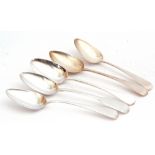 Mixed Lot: Four Georgian silver dessert spoons, Old English pattern, London, 1806, 1819 and 1830,