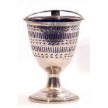Edward VII silver sugar basket, the pierced ovoid bowl with chased detail, double C-scroll swing