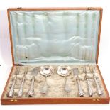 Art Deco period oak cased set of Continental silver/silver handled serving items including pair of
