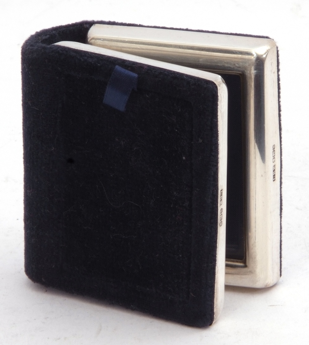 Modern white metal folding small double photograph frame in a blue velvet case, 7 x 5cm, London, - Image 2 of 2