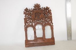 ORIENTAL WOODEN CARVING WITH THREE GLASS WINDOWS