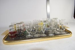 TRAY CONTAINING SMALL GLASSES