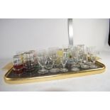 TRAY CONTAINING SMALL GLASSES