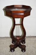 UNUSUAL MAHOGANY OCTAGONAL TABLE RAISED ON FOUR TURNED FEET WITH A LYRE SHAPED SUPPORT BELOW A