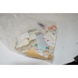 PLASTIC BAG CONTAINING STAMPS