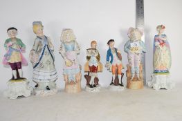 SEVEN CONTINENTAL PORCELAIN FIGURINES