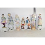 SEVEN CONTINENTAL PORCELAIN FIGURINES