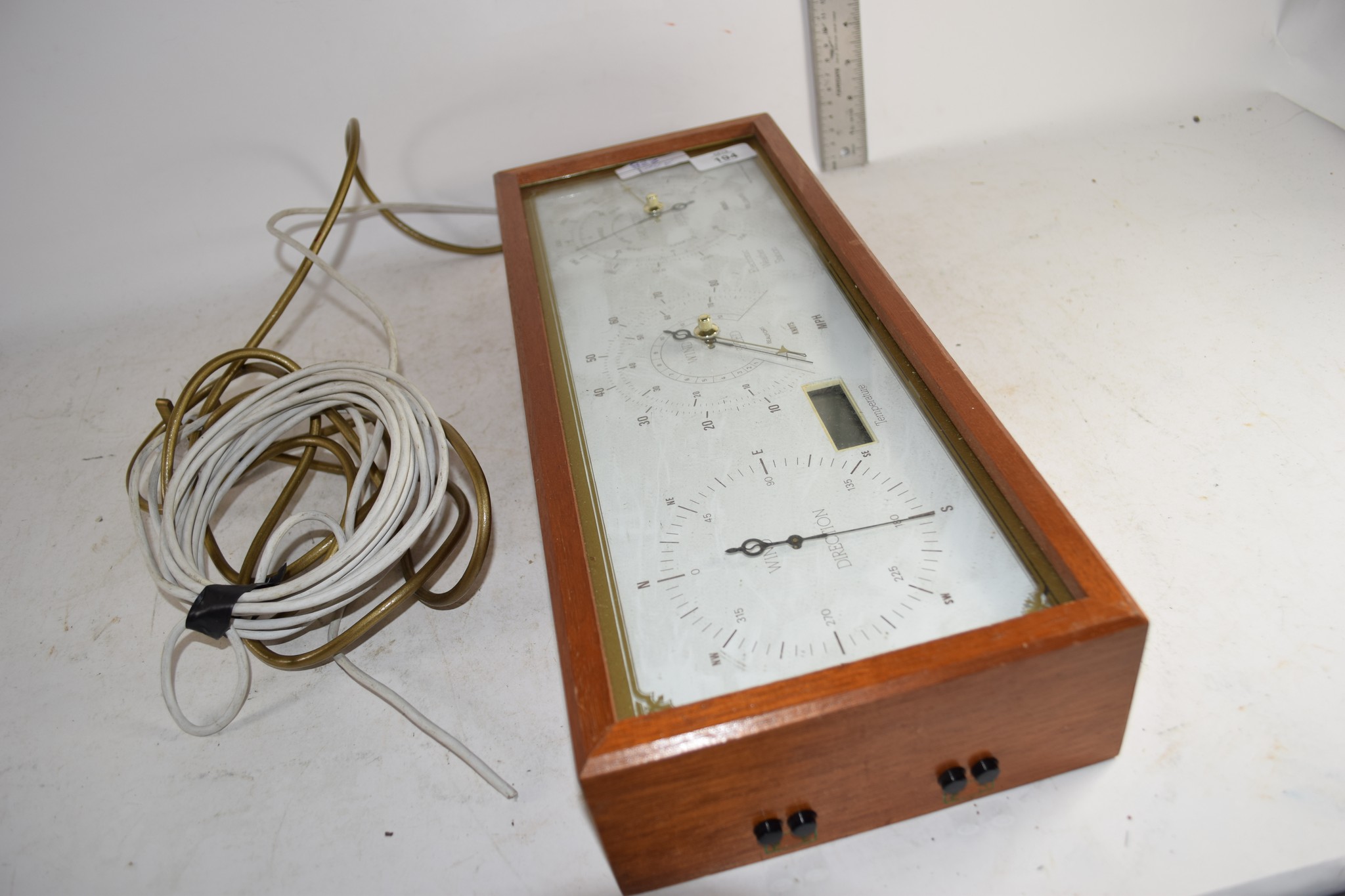 BOX CONTAINING PAPERWEIGHTS AND AN ELECTRONIC WEATHER STATION
