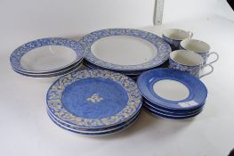 MODERN TEA WARES WITH A BLUE SCROLL DESIGN