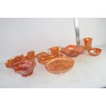 GROUP OF CARNIVAL GLASS, AMBER COLOURED, WITH VARIOUS IMPRESSED DESIGNS