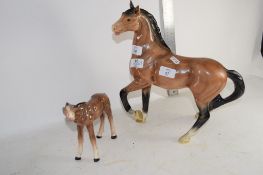 PAIR OF CERAMIC HORSES BY MELBA