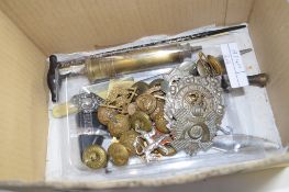 QUANTITY OF MILITARY BADGES AND BUTTONS ETC INCLUDING A BRASS PLAQUE, BRASS PUMP AND SILVER COAT