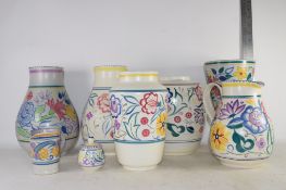 POOLE WARES WITH TYPICAL FLORAL DESIGNS, MAINLY 1960S/1970S, A SMALL JUG WITH TRUDA CARTER DESIGN