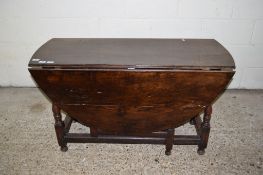 18TH CENTURY AND LATER OAK GATE LEG TABLE, THE LATER TOP RAISED ON RING TURNED SUPPORTS, JOINED