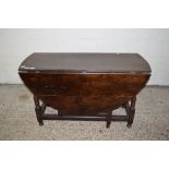 18TH CENTURY AND LATER OAK GATE LEG TABLE, THE LATER TOP RAISED ON RING TURNED SUPPORTS, JOINED