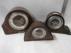 BOX CONTAINING THREE MANTEL CLOCKS IN WOODEN CASES