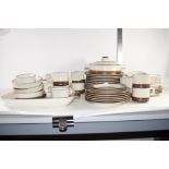 DINNER WARES BY DENBY IN A BROWN DESIGN COMPRISING PLATES, SIDE PLATES, TWO TUREENS AND COVERS, CUPS