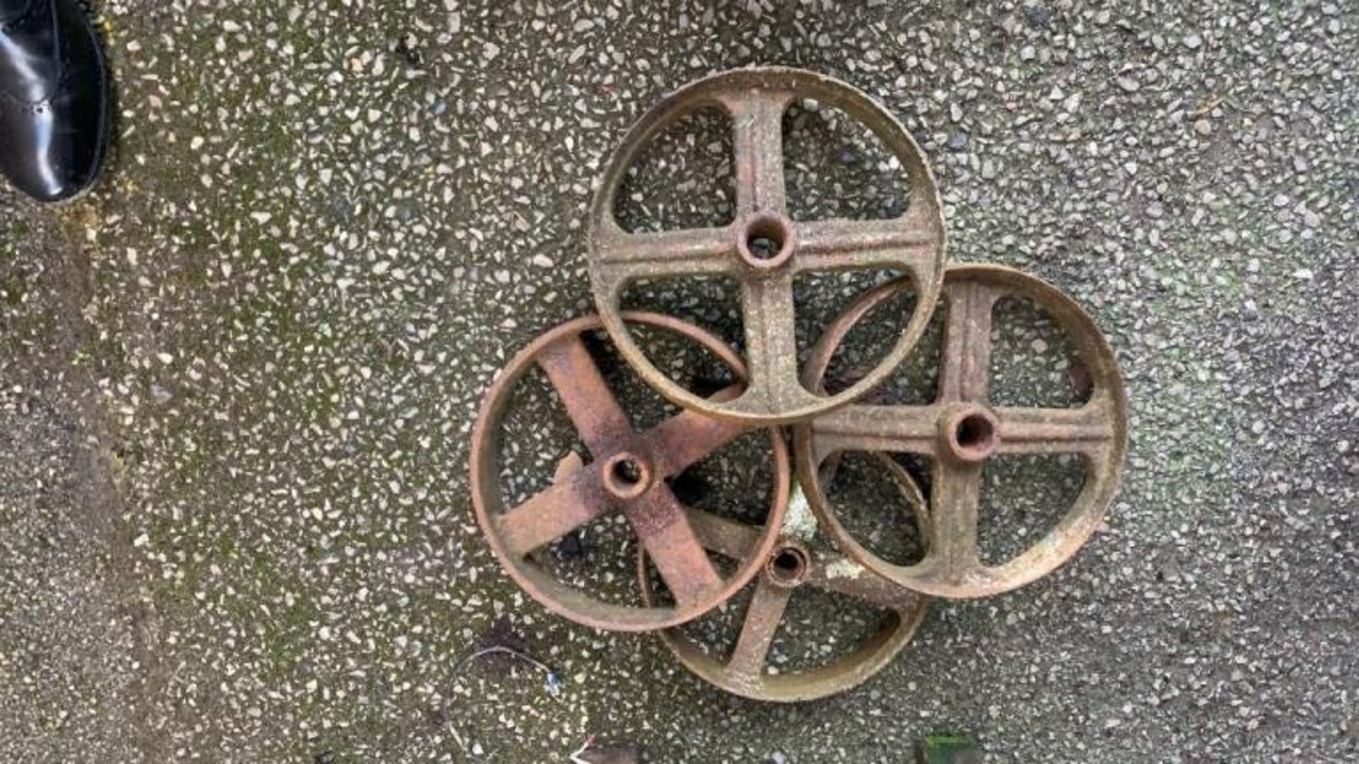 Four various cast iron Wheels