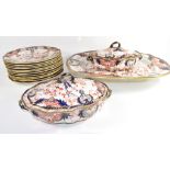 Group of Royal Crown Derby dinner wares including two tureens and covers, a large meat platter and