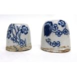 Pair of Chinese porcelain inkwells, both decorated in underglaze blue with floral designs