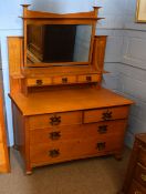 Early 20th century Art Nouveau oak wardrobe having a spreading balustraded pediment over a single