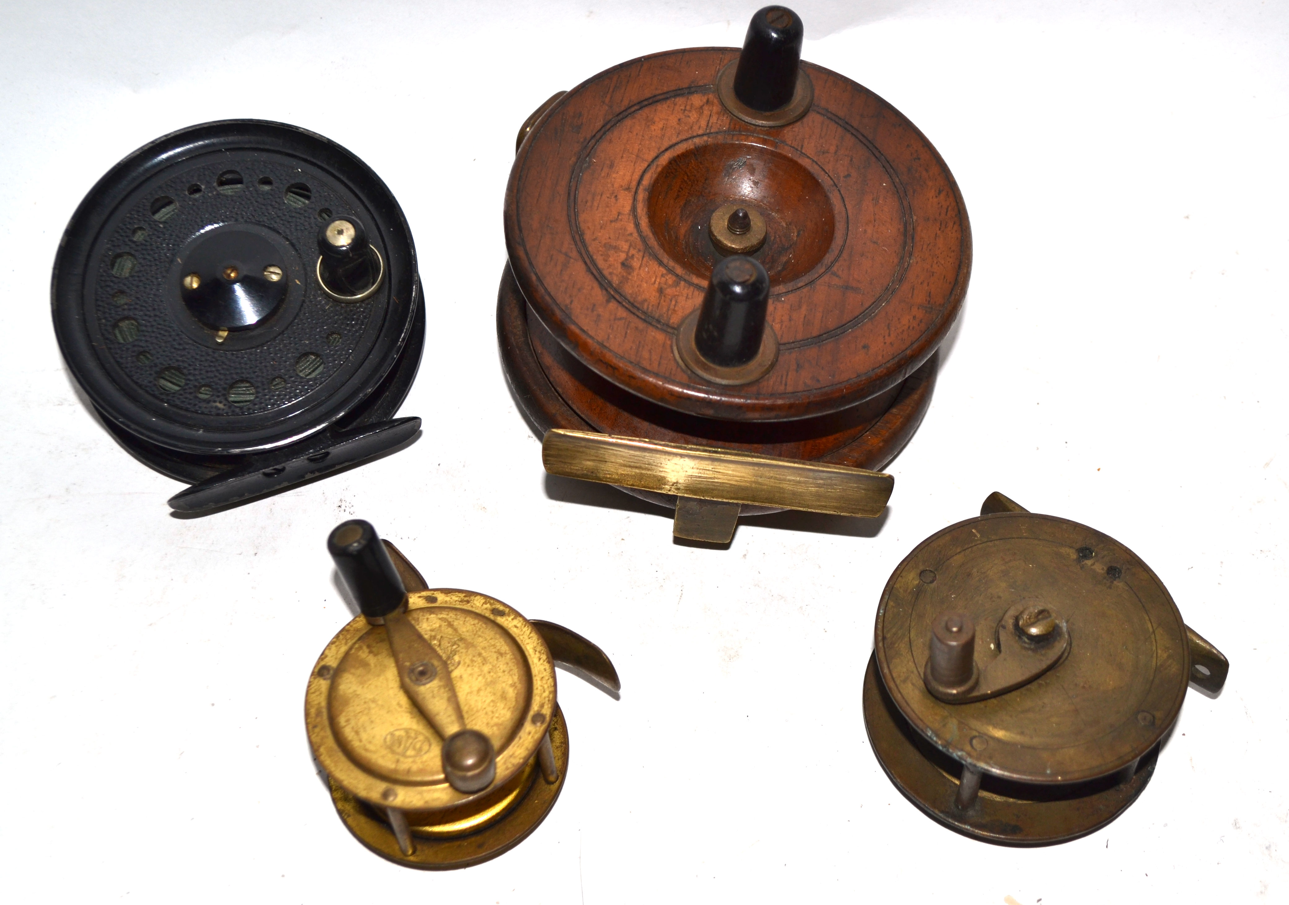 Box containing four fishing reels