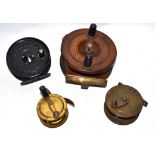 Box containing four fishing reels