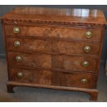 Late Georgian mahogany chest of four graduated drawers with circular embossed brass ring handles