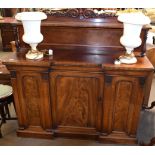 19th century mahogany break front sideboard, scroll moulded pediment over a shelf supported by