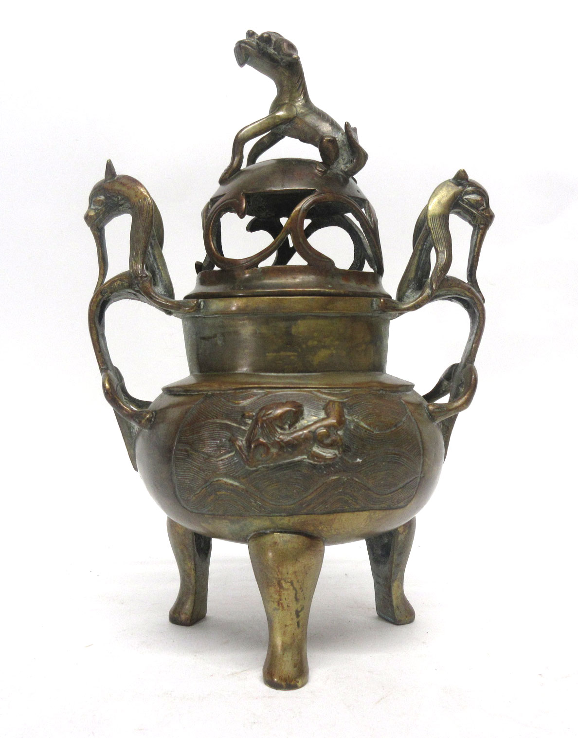 Oriental brass Koro and cover with dragon finial, height 26cm