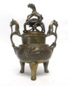 Oriental brass Koro and cover with dragon finial, height 26cm