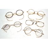 Small box containing quantity of vintage spectacles